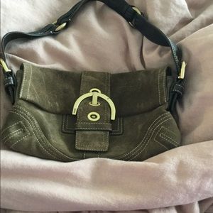 Brown Suede small Coach purse.